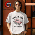 Rob Mac wearing Mama’s BBQ Walk In Pig Out shirt