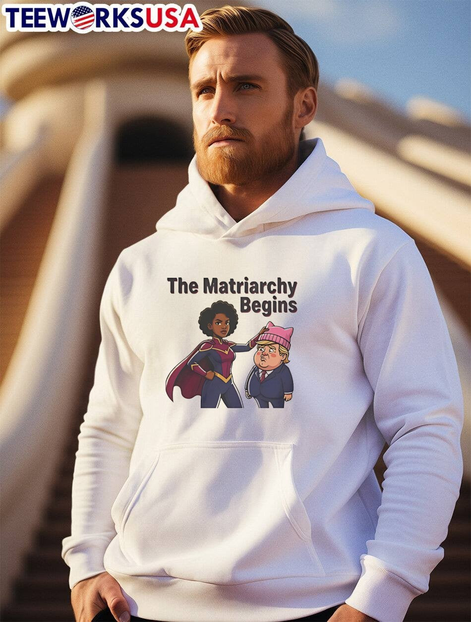 The Matriarchy Begins Superhero Placing Pussyhat on Trump T-Shirt