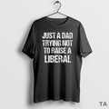 Top Just A Dad Trying Not To Raise A Liberal Vintage T Shirt Sweater Hoodie, Sweatshirt | AU01DripNestTees.com