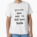 Life is shit smile while you still have teeth. by HenryClinton